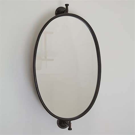 true antique metal swivel oval mirror with fist bracket|swivel mirrors for sale.